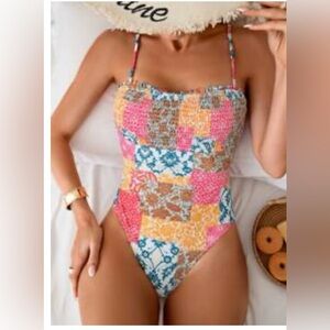 SHEIN multicolored one piece swimsuit.